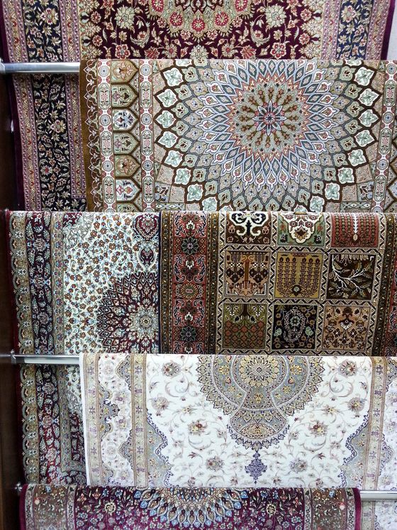 Carpets hanging in the gallery