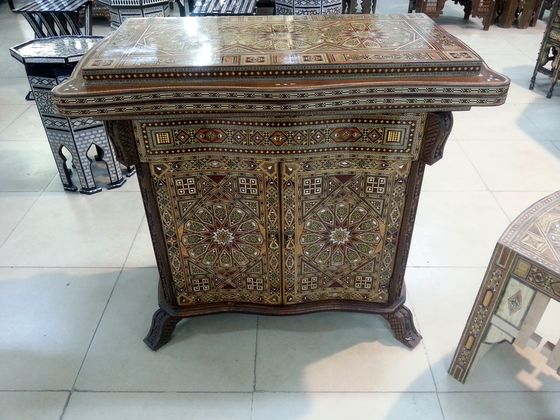 Inlaid cabinet with a hinged top
