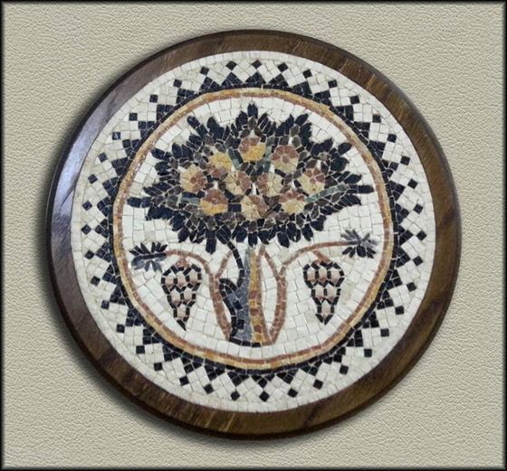 Round framed mosaic of a fruit tree